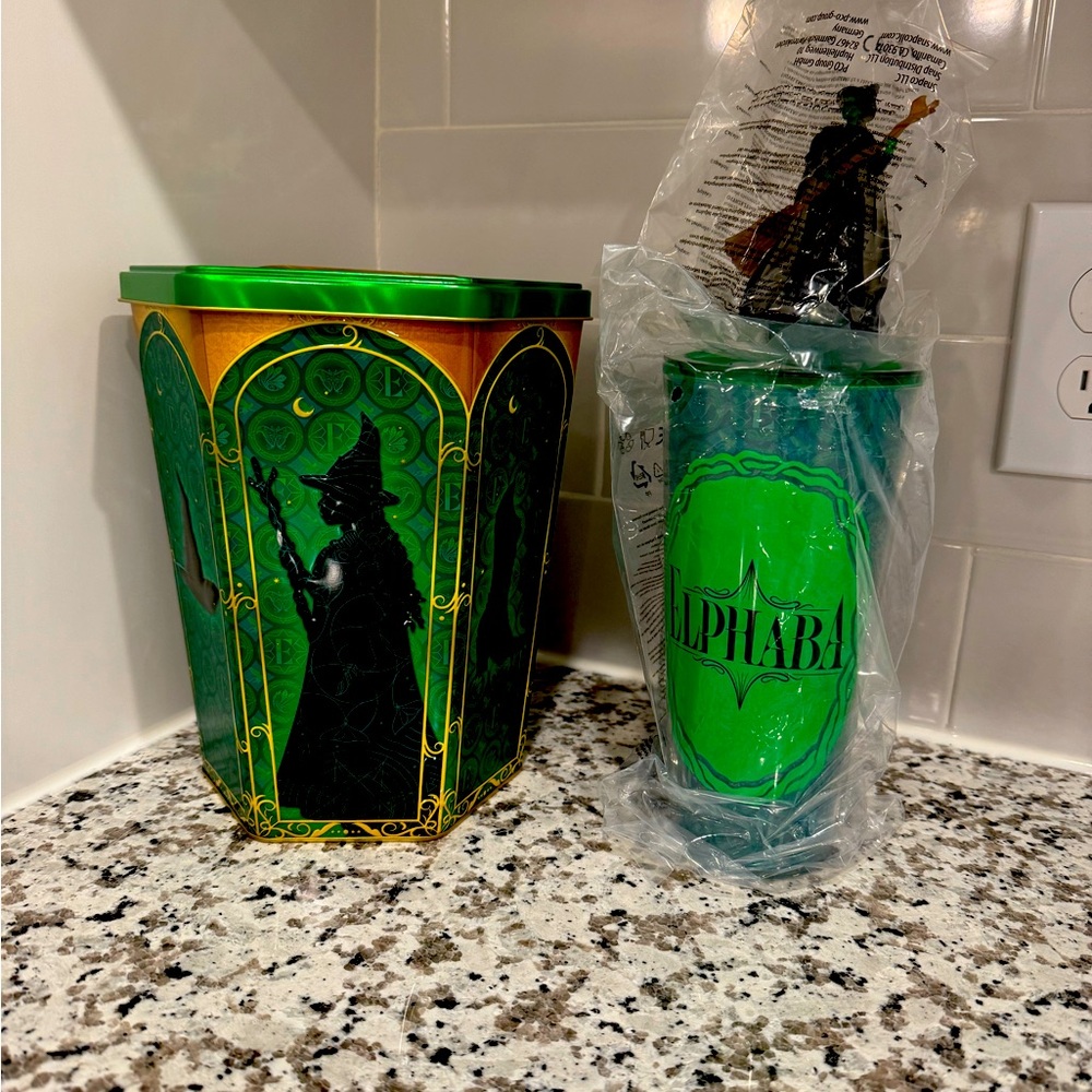 Regal Exclusive Wicked Elphaba popcorn tin and reusable cup with cup topper.